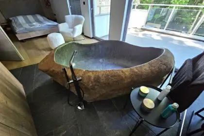 A Real Natural Stone Bathtub in the Bedroom? Why Not.