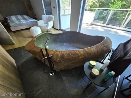 Natural stone bathtub bedroom